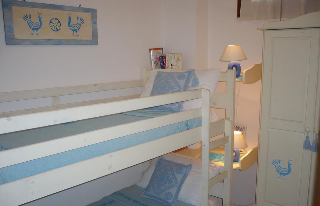 Apartamento Le Pavoncelle Alguer Habitación foto