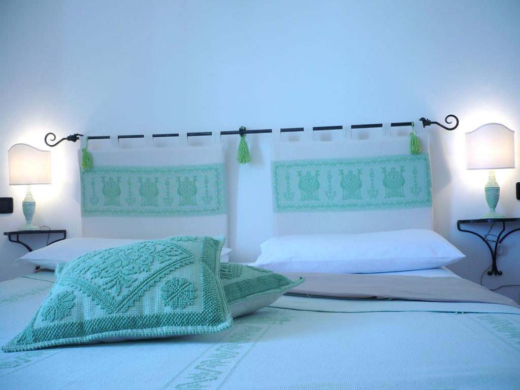 Apartamento Le Pavoncelle Alguer Habitación foto