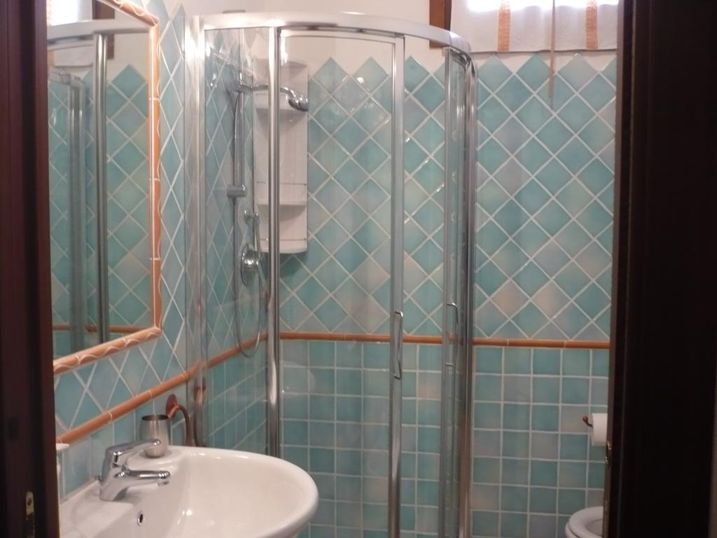 Apartamento Le Pavoncelle Alguer Habitación foto